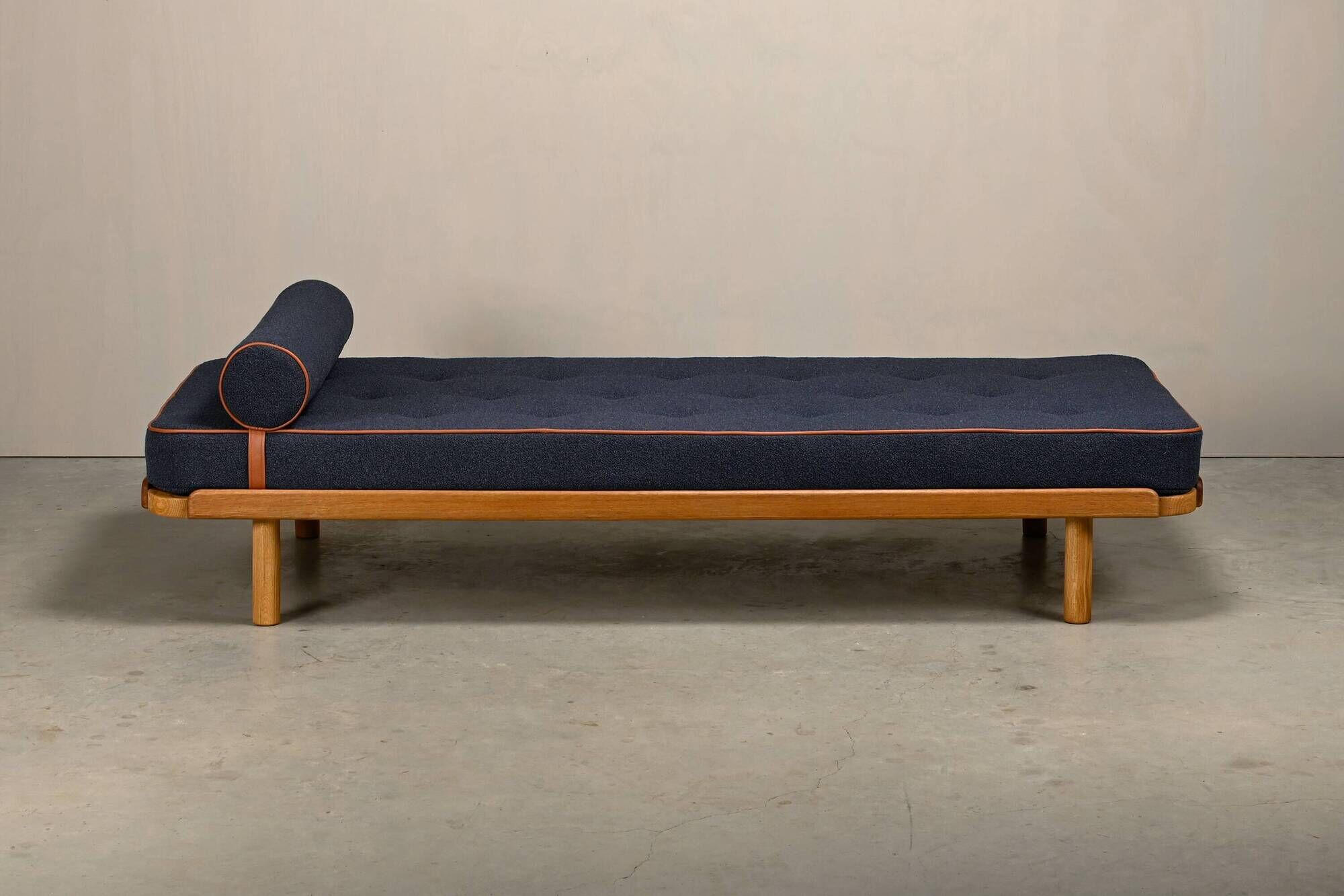 Scandinavian Daybed in Oak and dark Blue bouclé fabric with Leather accents