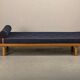 Scandinavian Daybed in Oak and dark Blue bouclé fabric with Leather accents