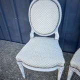Pair of lacquered Louis XVI style chairs
