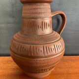 Trio of vintage vases in chiselled terracotta