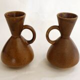 Pair of stoneware pitchers and vases
