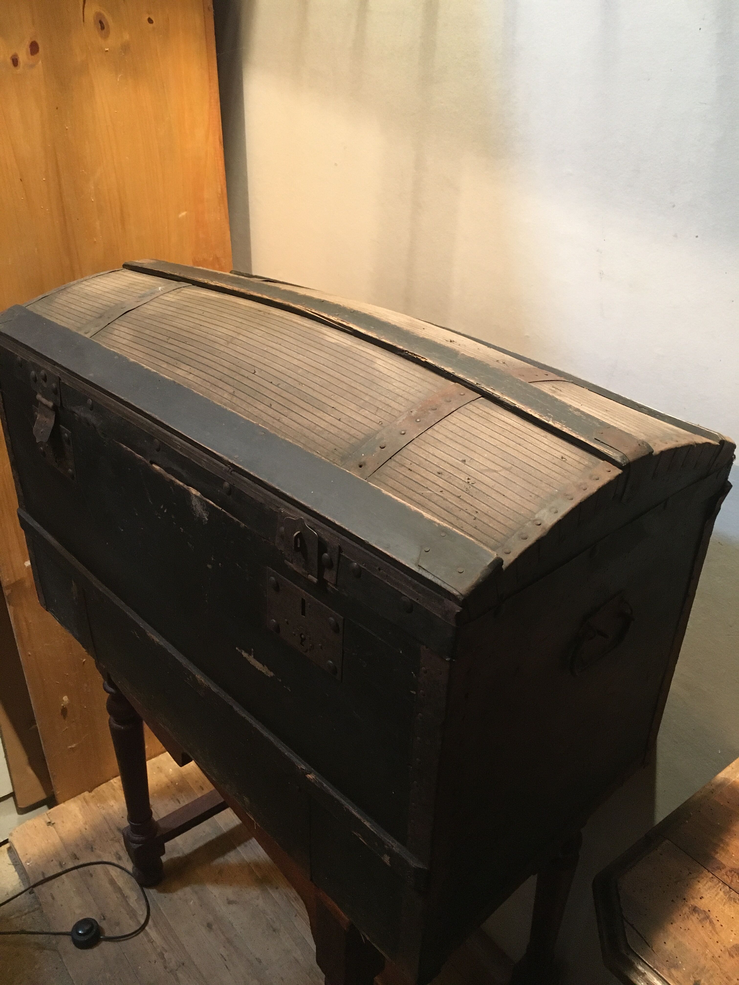 Black travel trunk with a fabric top