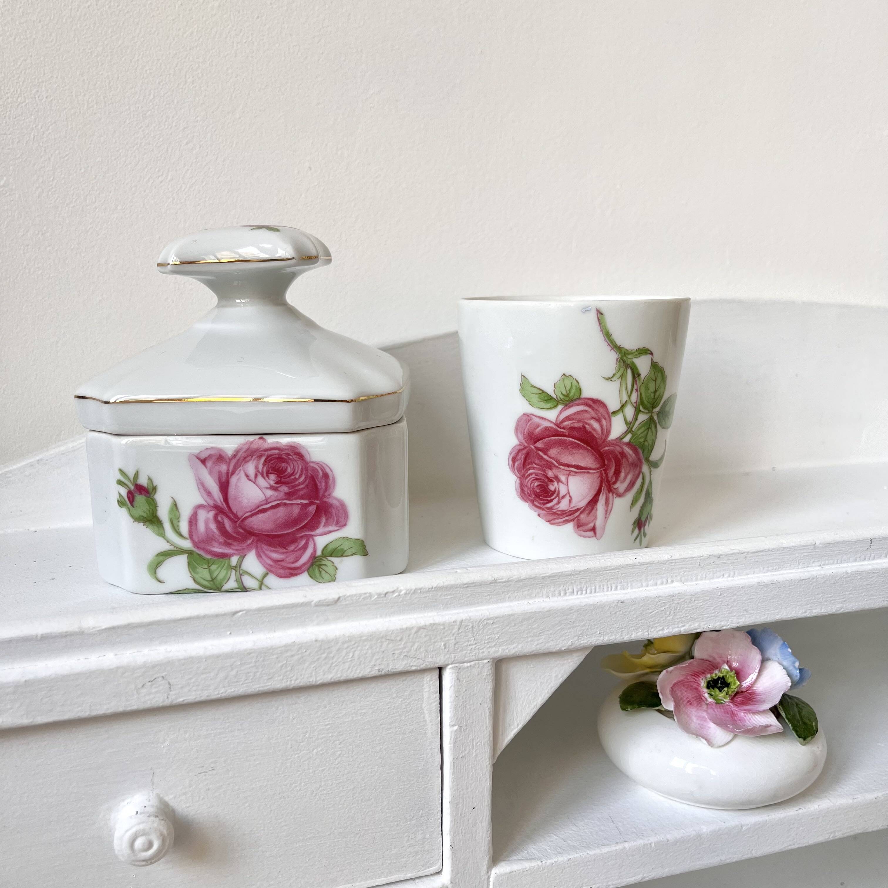 Limoges porcelain toiletry bottles decorated with roses