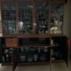 Library, glass-fronted mahogany cabinet