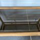 Vintage 1950s rattan and glass TV storage unit.