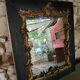 Antique mirror in stucco and wood
