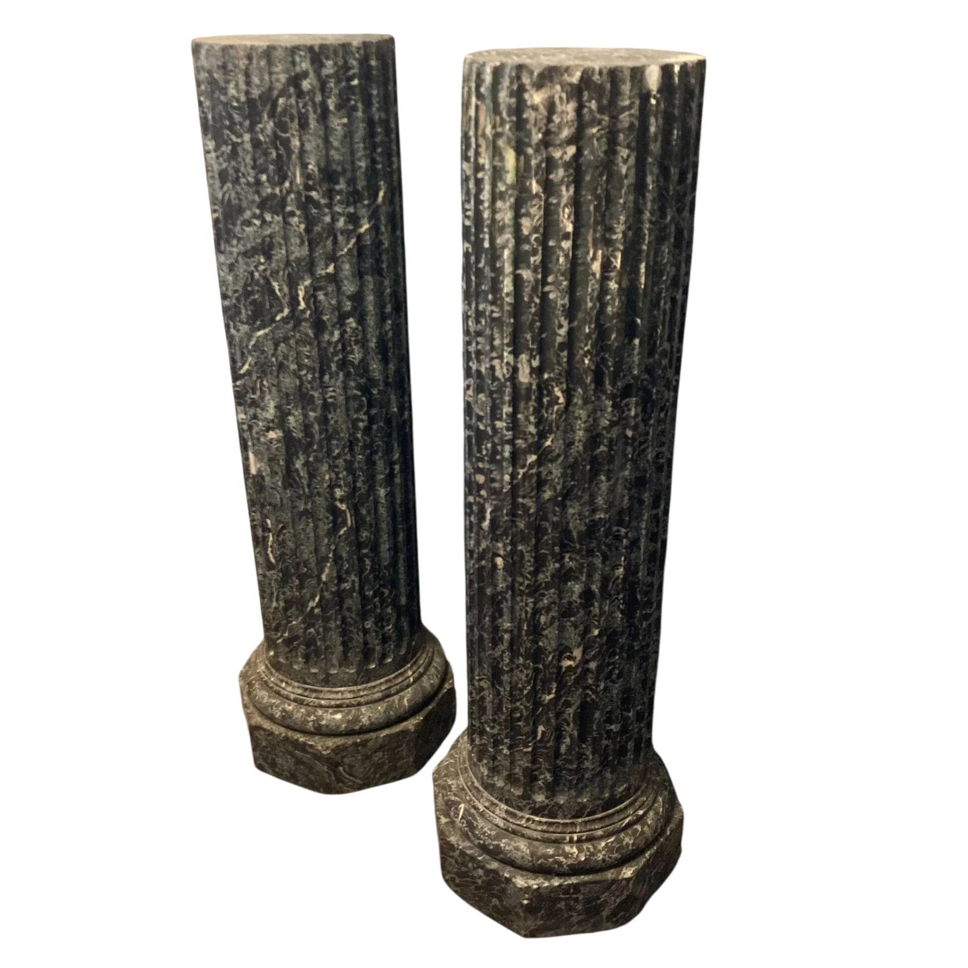 Pair of black and green scagliola columns from the 19th century.