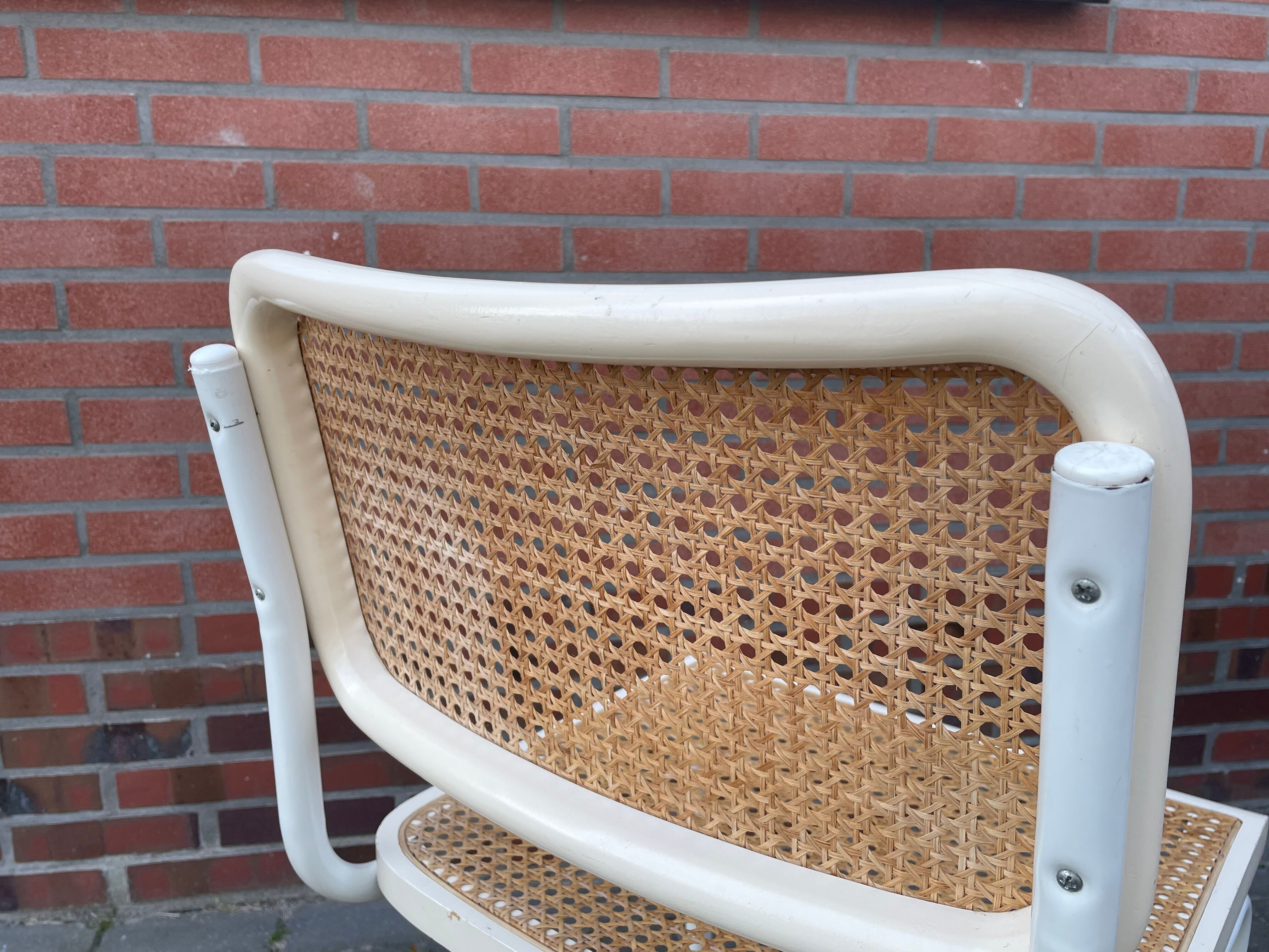 Cesca dining room chair designed by Marcel Breuer