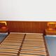 Double bed in vintage Scandinavian style from the 1960s with bedside tables in teak.
