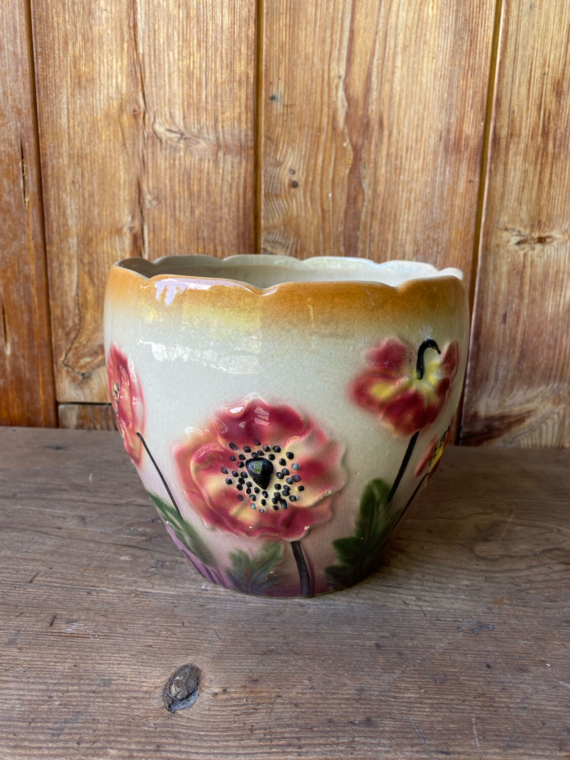 Earthenware cache pot with slip decoration.