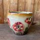 Earthenware cache pot with slip decoration.
