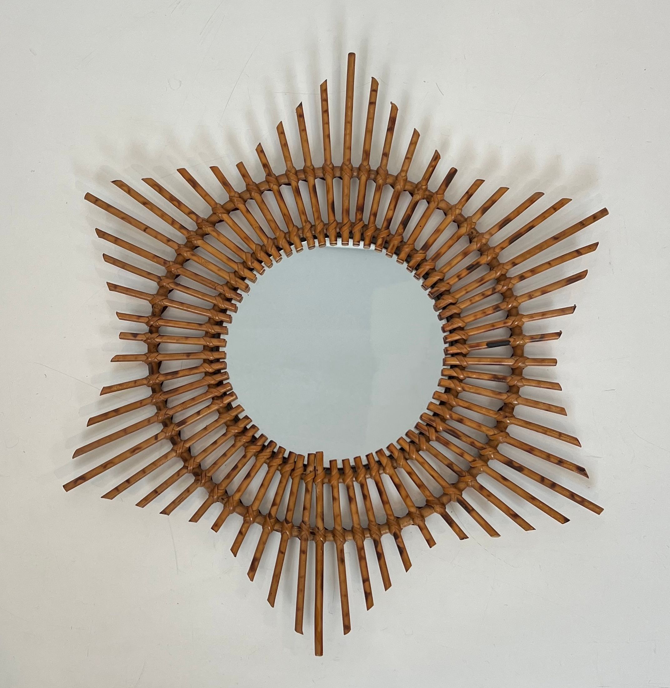 Rattan mirror in the shape of a star.