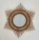 Rattan mirror in the shape of a star.