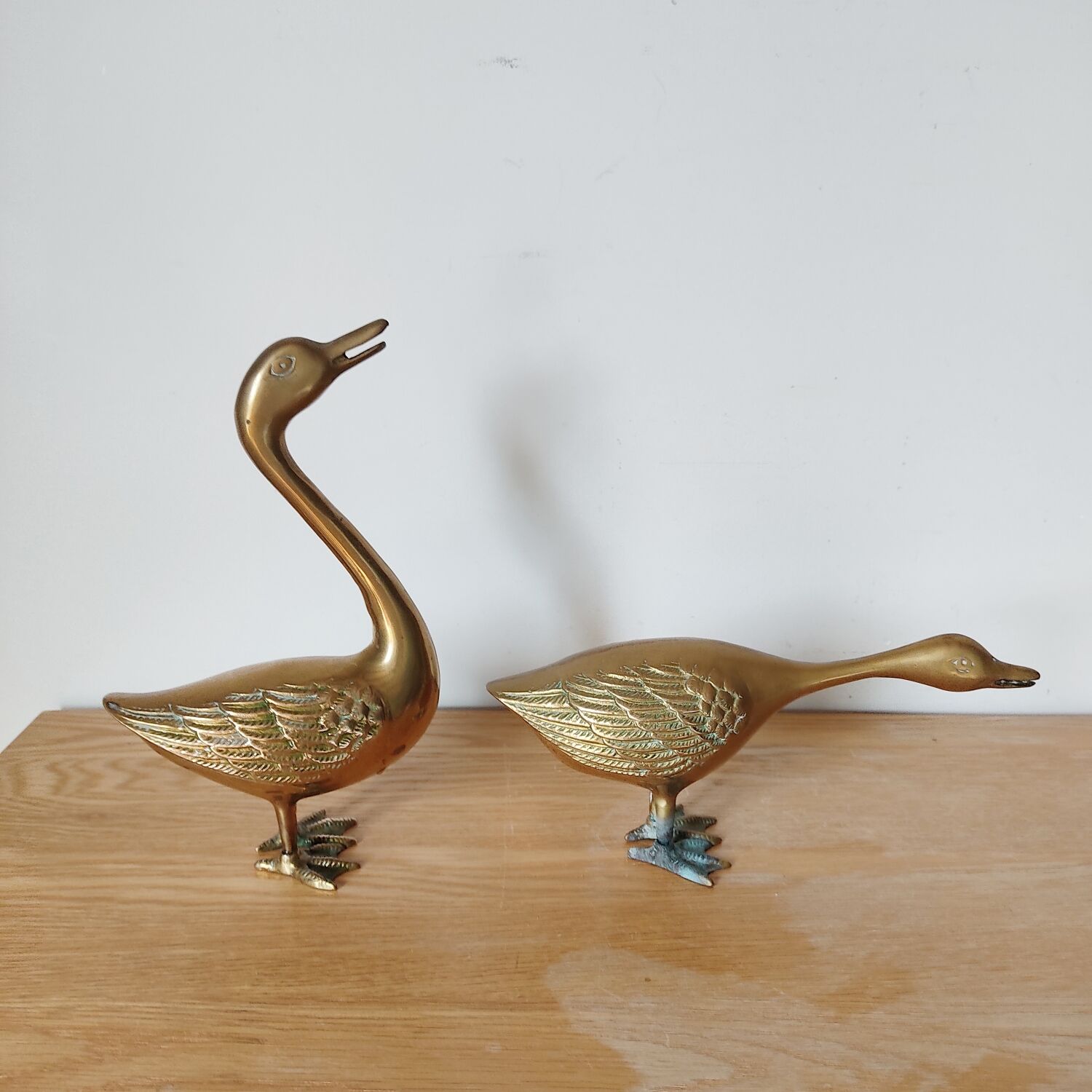 Pair of brass geese