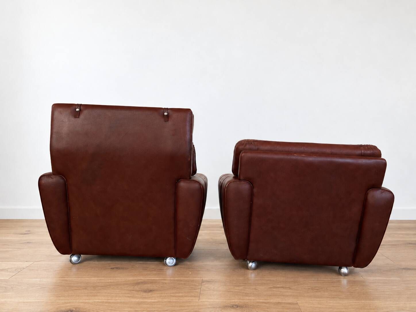 Vintage Danish mid-century lounge chairs by Svend Skipper in burgundy leather