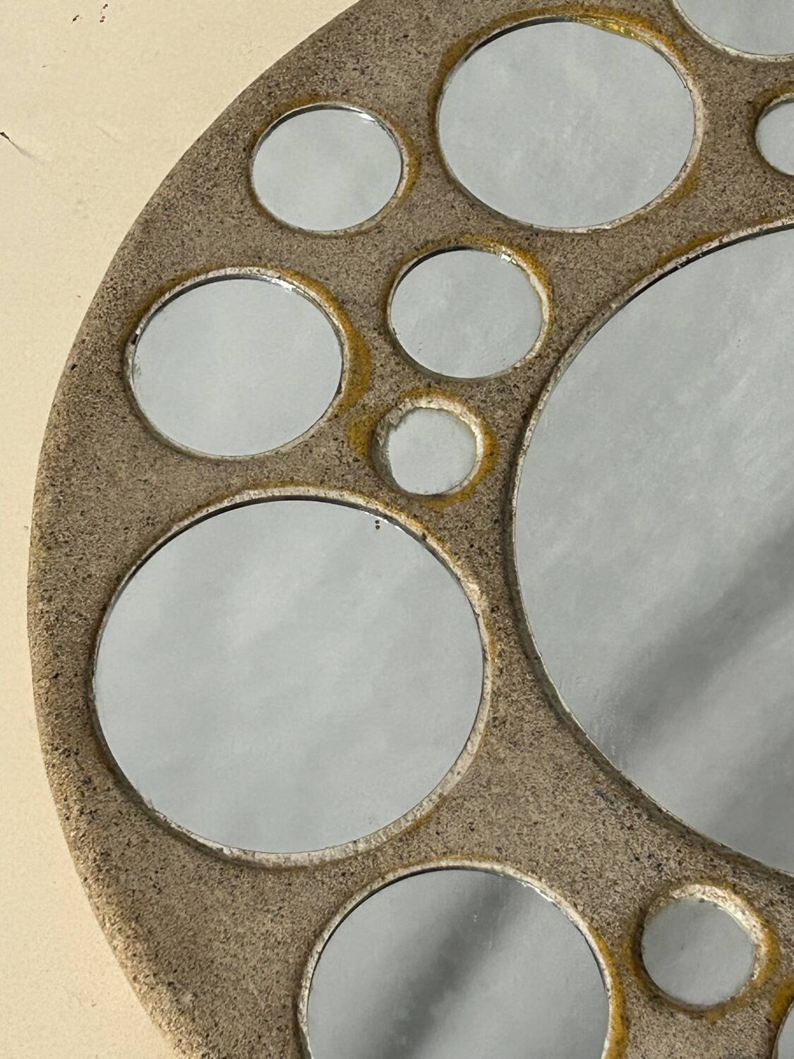 Round ceramic mirror
