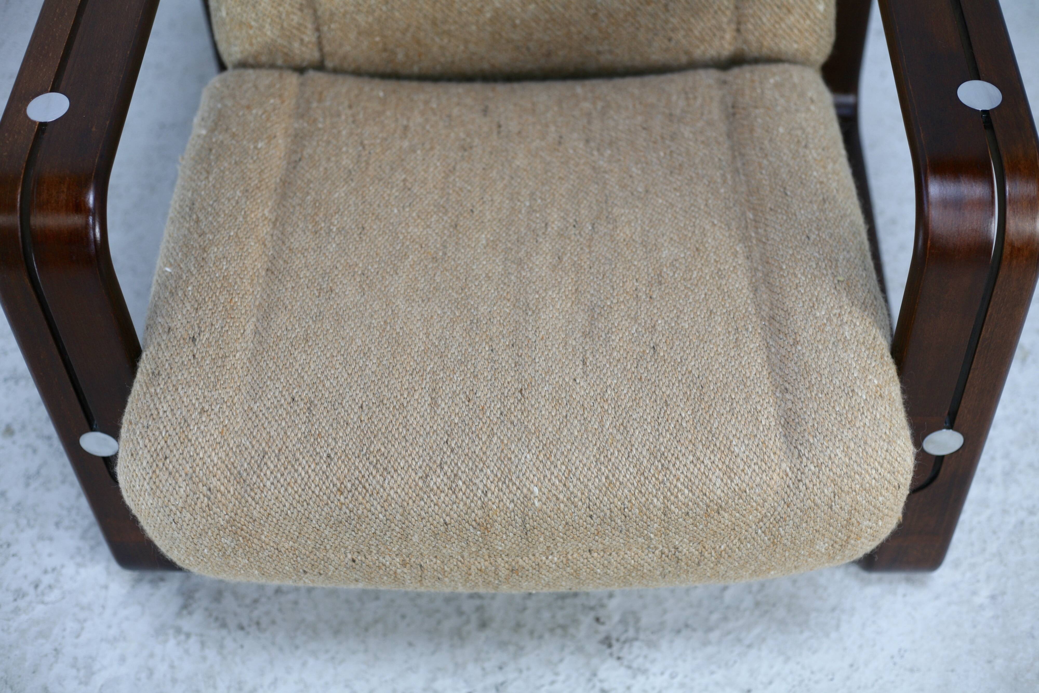 Modernist armchair. Wool, wood and steel. Circa 1970