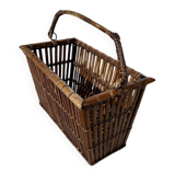 Brown wicker/rattan basket-shaped magazine rack