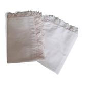 Old baby bed linen adornment