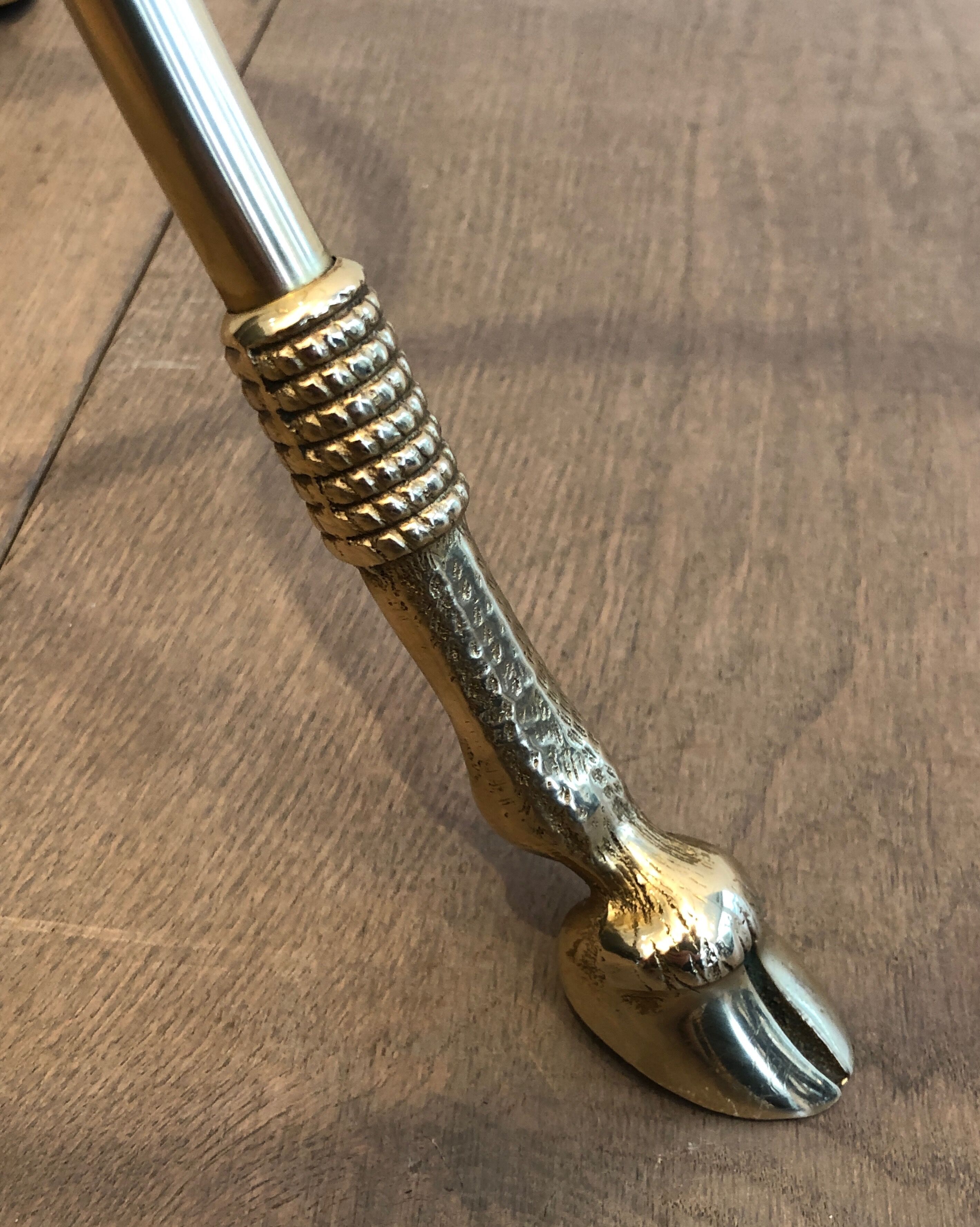 Neoclassical style tripod pedestal table in brass and round glass top in the taste of the House