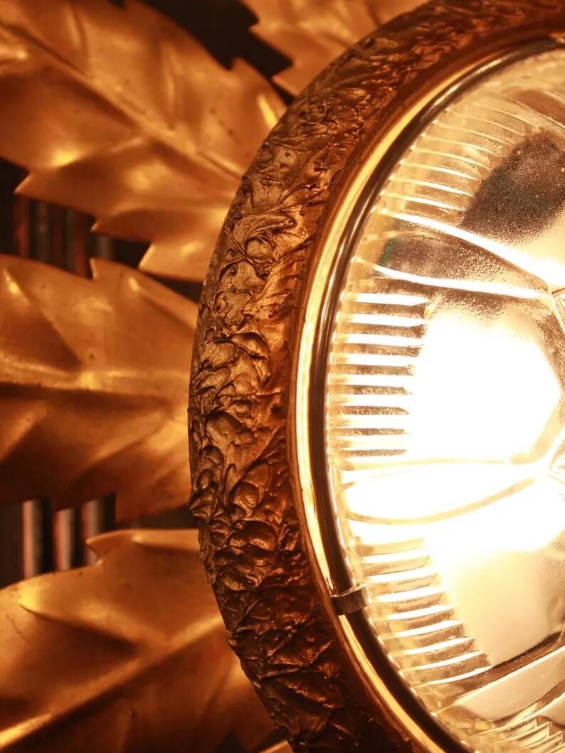 Gold metal wall sconce with cut glass in Hollywood Regency style from the 1960s.