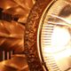 Gold metal wall sconce with cut glass in Hollywood Regency style from the 1960s.