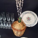 Small bottle style dame Jeanne and its wicker