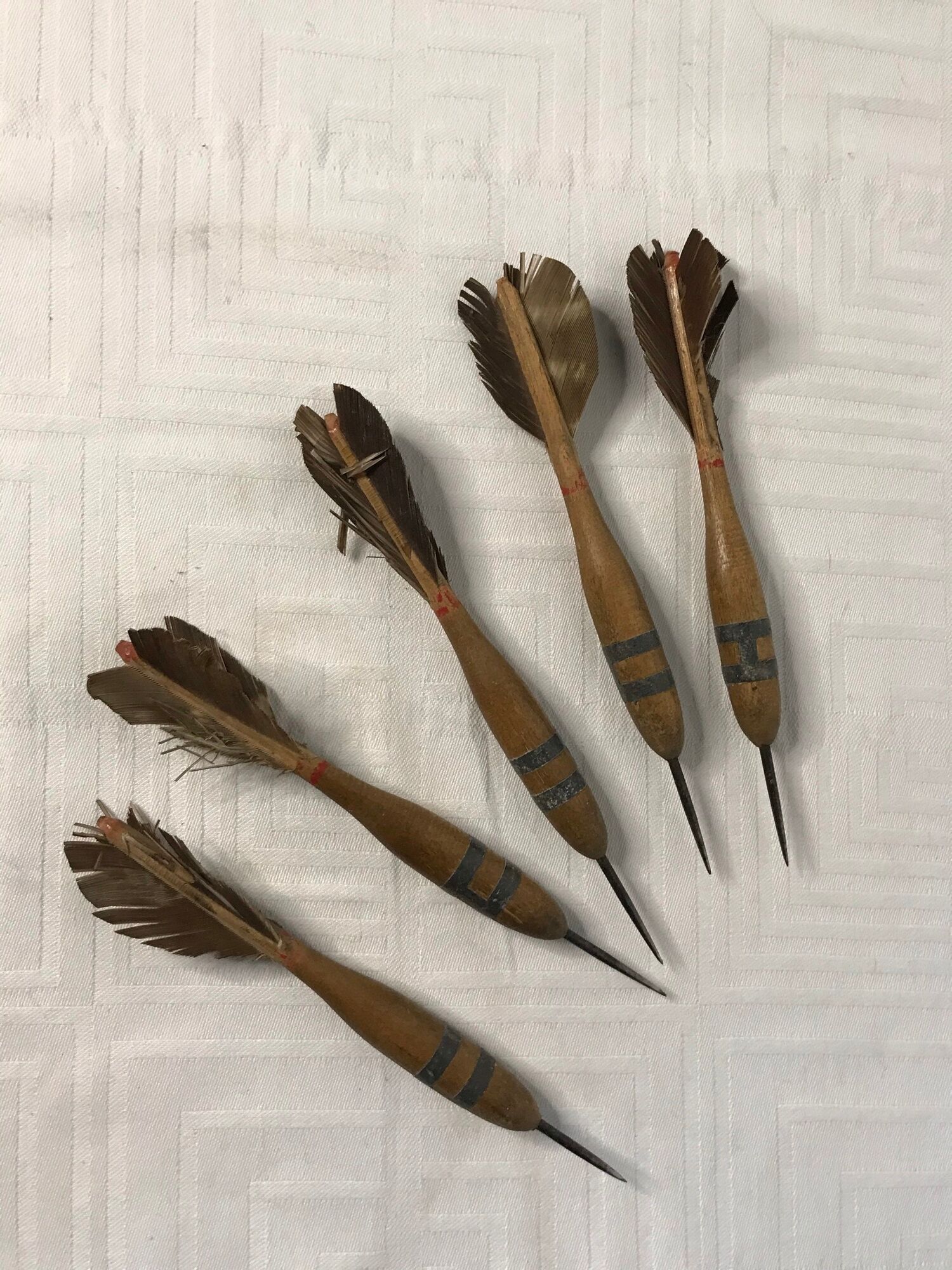 Old toy target round cardboard and feather darts 1960