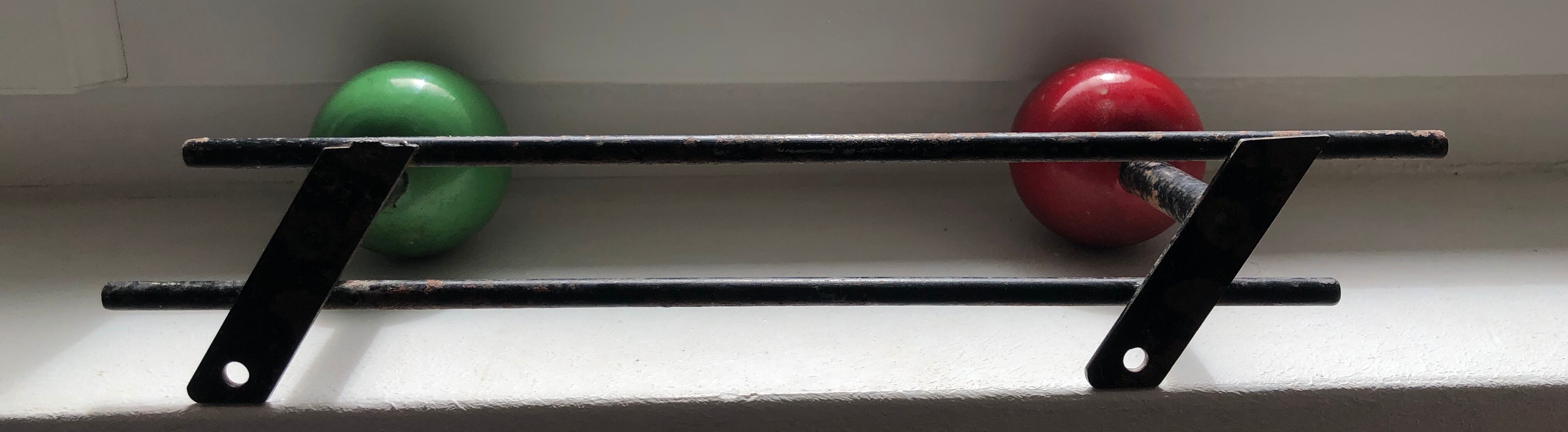 Patère two vintage balls wears old coat