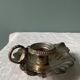 Old leaf-shaped hand candle holder, mid-twentieth