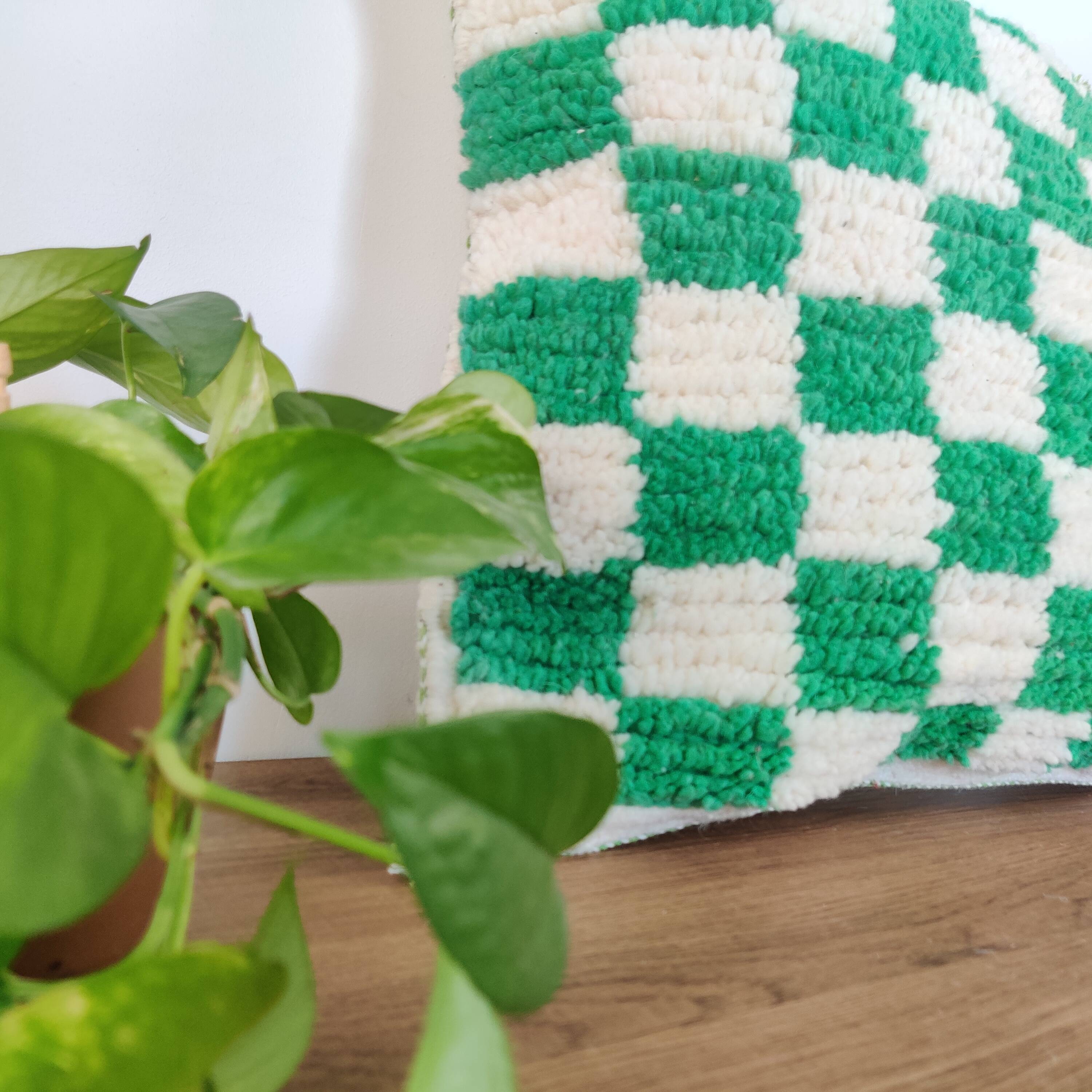 Berber green checkerboard cushion