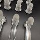 12 Baccarat crystal knife holders, Houdon model, 19th century.