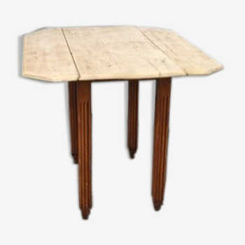 Dining room table with folding sides