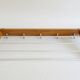 Wall coat rack with hat rack made of teak and gold metal,