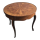 Round marquetry coffee table with curved legs in Louis XV style.