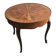Round marquetry coffee table with curved legs in Louis XV style.