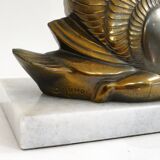 Swan bookends on marble