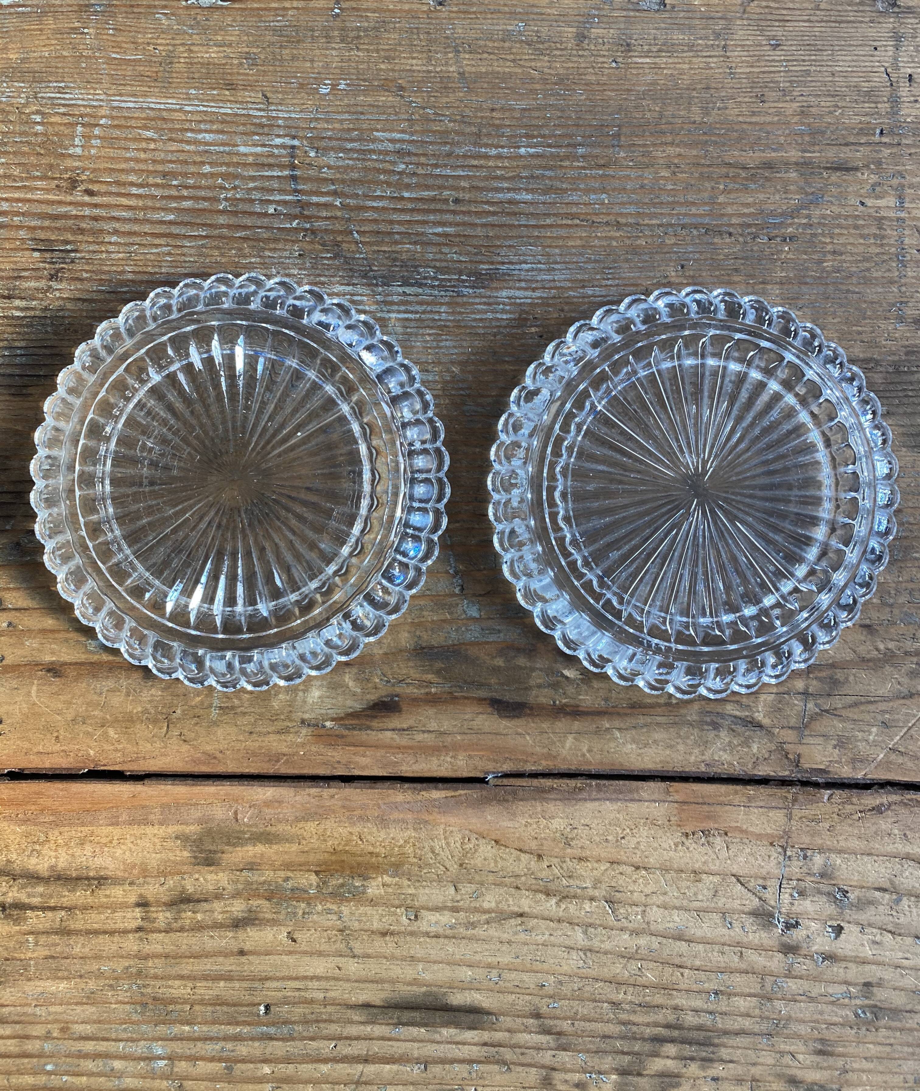 Lot de 2 dessous de bouteilles en verre