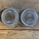 Lot de 2 dessous de bouteilles en verre