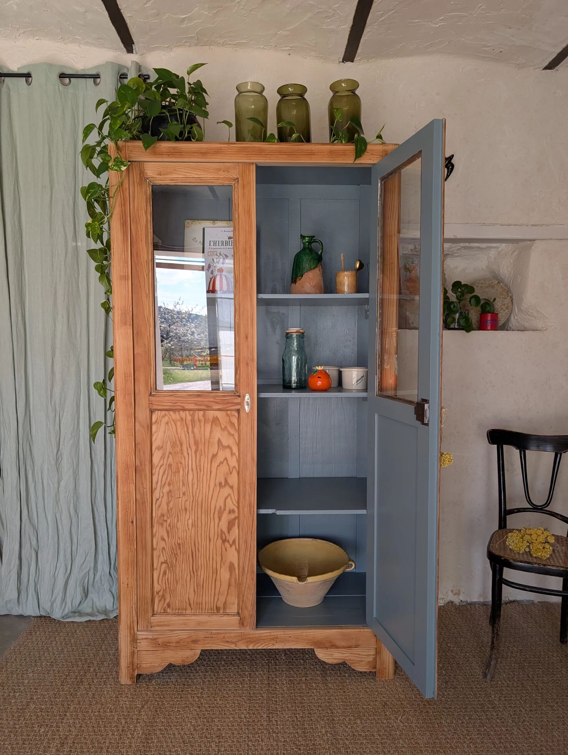 Old glass-fronted wooden library – blue interior