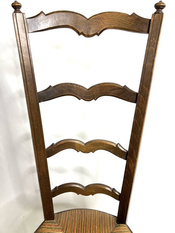 Chaise de nourrice ancienne en bois et paille – dossier ajouré à barreaux c