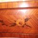 Flowered marquetry commode in Louis XV style