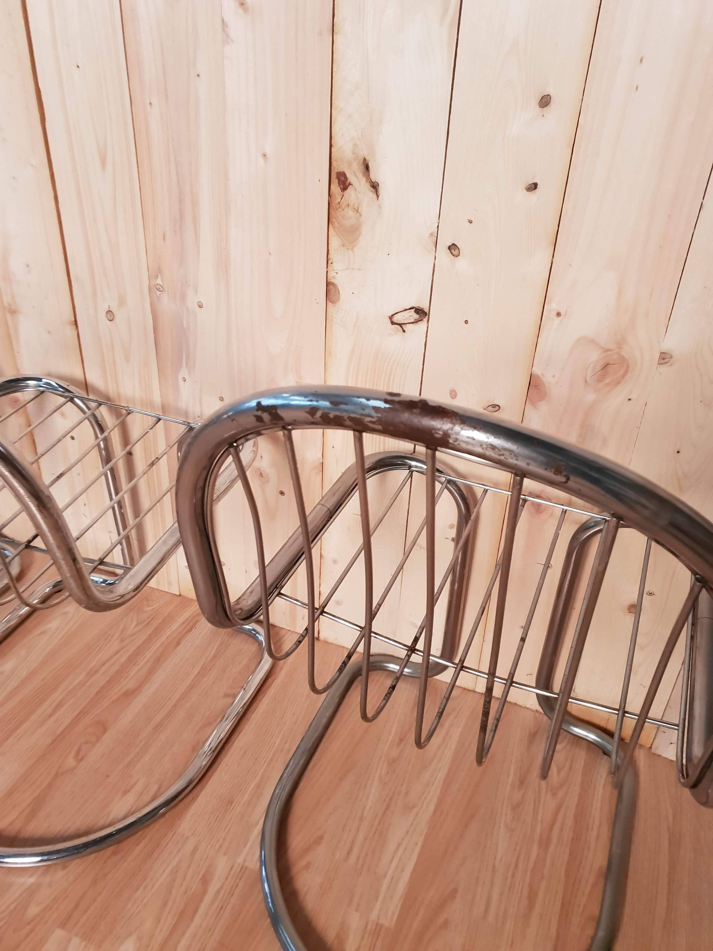 Set of 6 vintage stainless steel rounded chairs