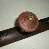 Wooden wall-mounted coat rack