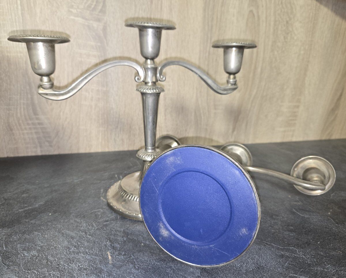 Pair of three-light candlesticks in silver-plated metal