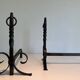 Pair of Neoclassical Fire Dogs in Wrought Iron with Twisted Columns, Finials