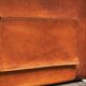 Trompe-l'Oeil magazine rack 'Actentasche' in patinated leather and canvas