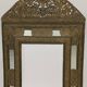 Antique mirror in repoussé and patinated copper from the Napoléon III era.