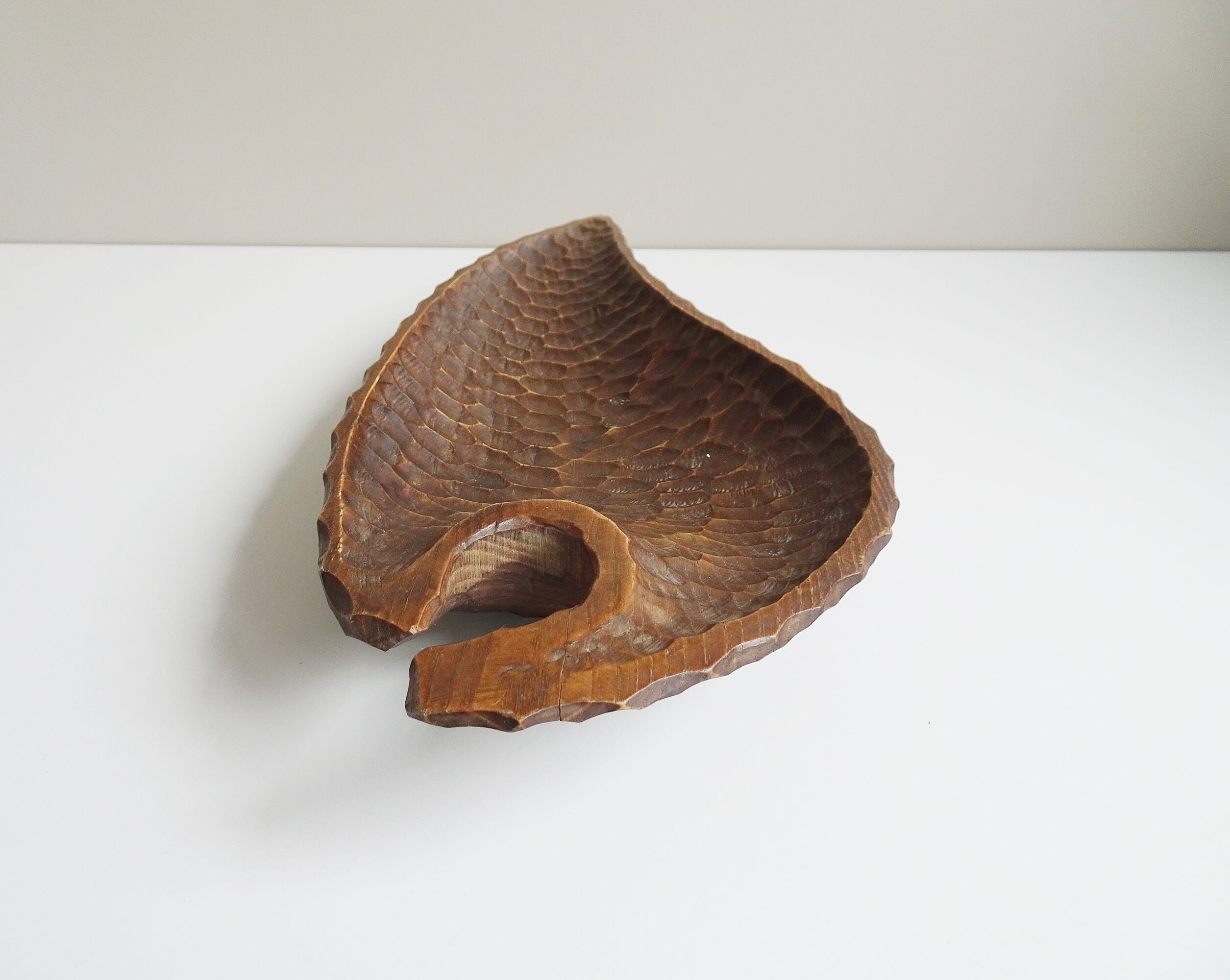 Antique hand-carved wooden bowl