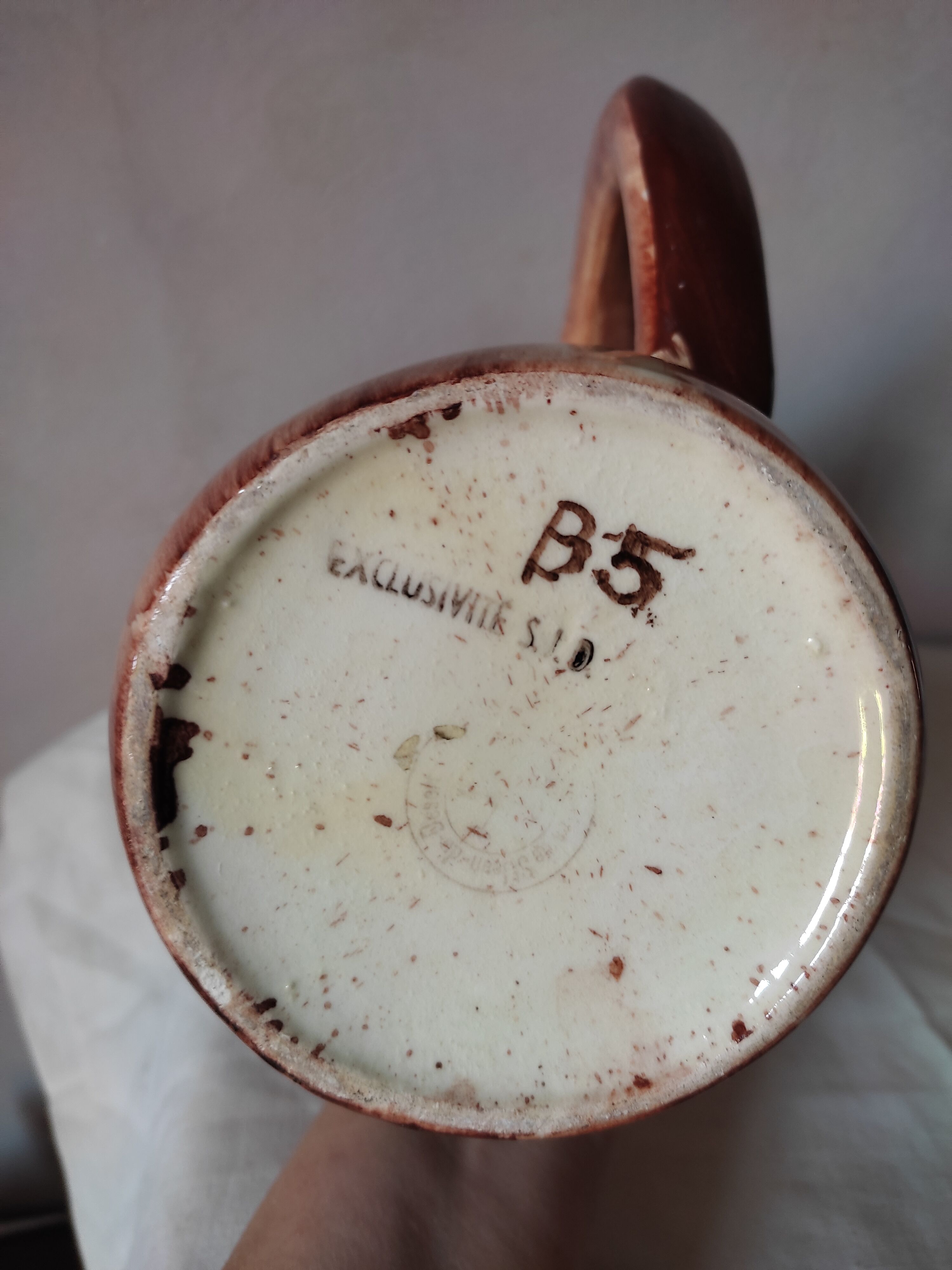 Earthenware decanter in false wood